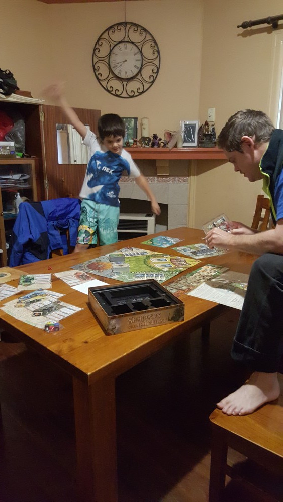 J and 7yo playing Shadows Over Camelot