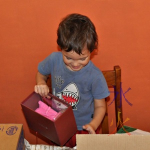 3yo with box of pretty things