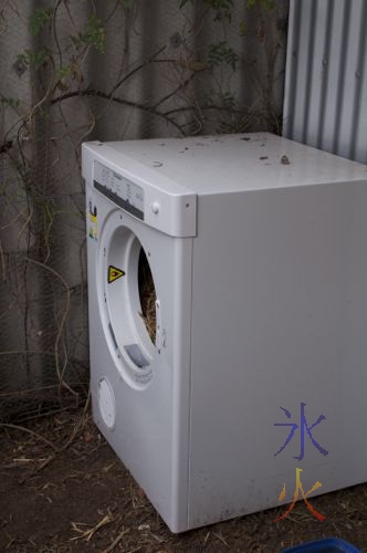 Old broken drier converted to a nesting box