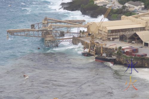 Broken phosphate ship at Flying Fish Cove on Christmas Island from Territory Day Park