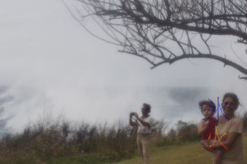 Getting sprayed by the waves coming up the cliff