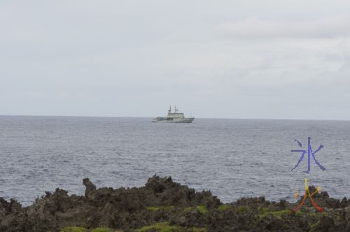Navy ship off the cliffs above Lily Beach