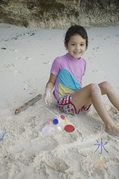 Decorated sand mound