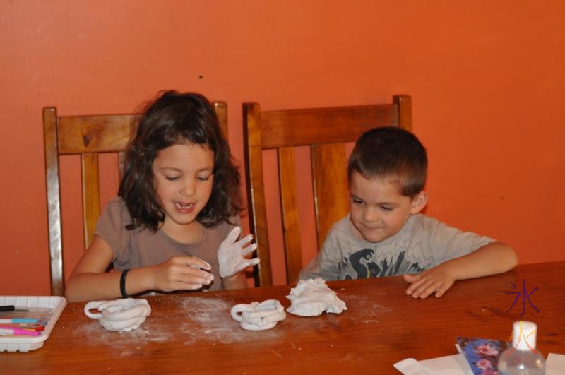 7yo making a tea set with air dry modelling clay