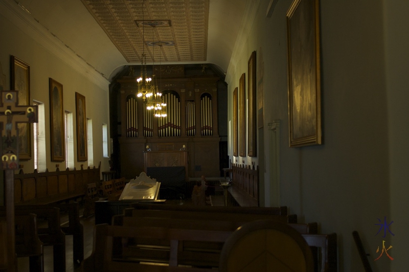 Church interior showing tomb and pipe organ, New Norcia, Western Australia