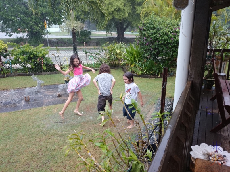 Jumping in a huge puddle in the garden