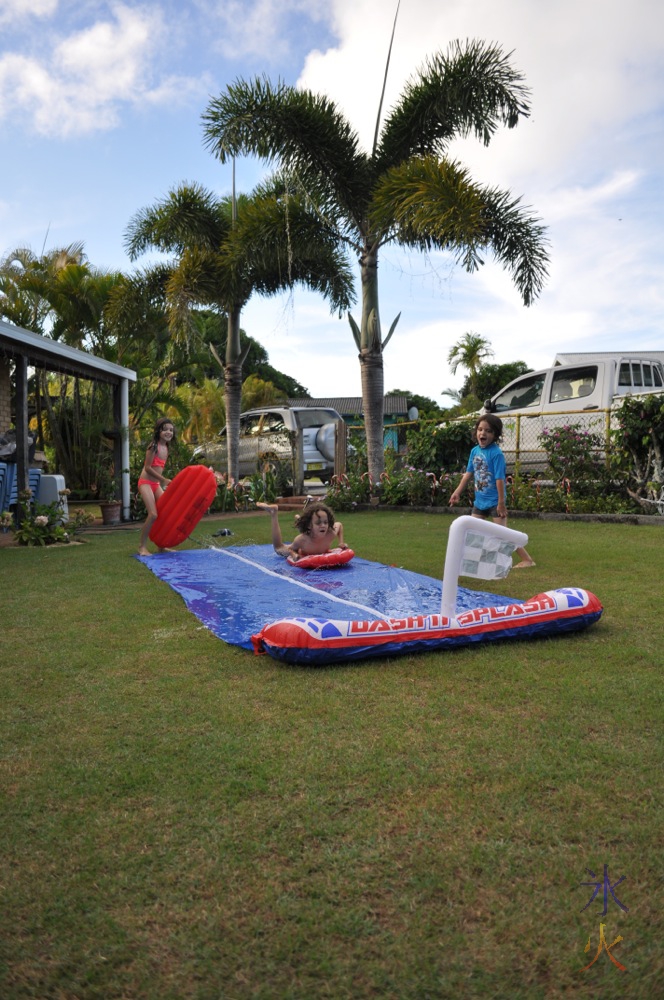 Kids playing on waterslide