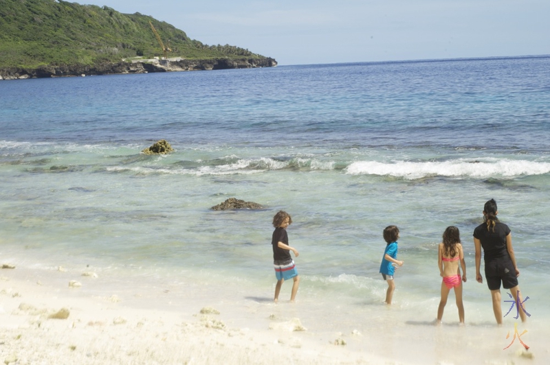 Scenic shot of us looking for fish in rock pools at Ethel Beach, Christmas Island, Australia