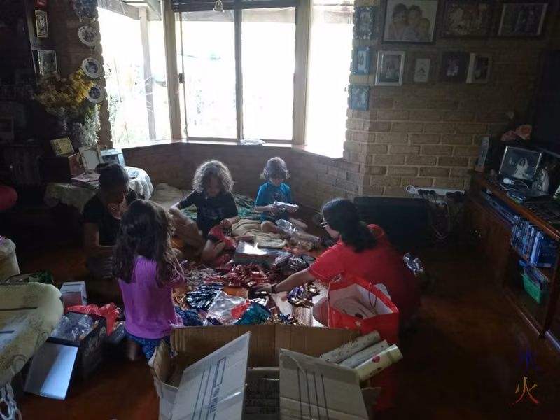Putting together loot bags for Carols by Candlelight