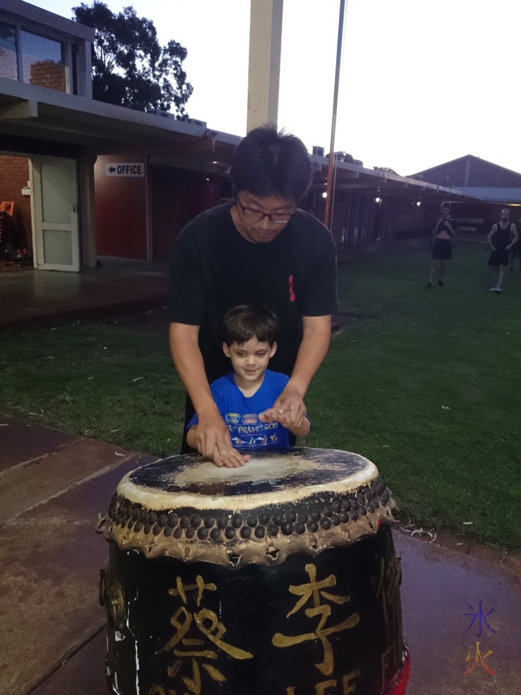 6yo being taught lion dance drum patterns