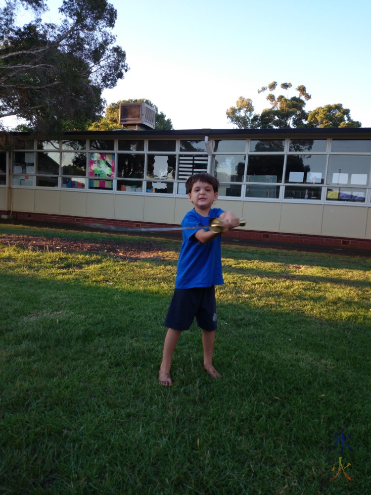 6yo swinging a Chinese broadsword