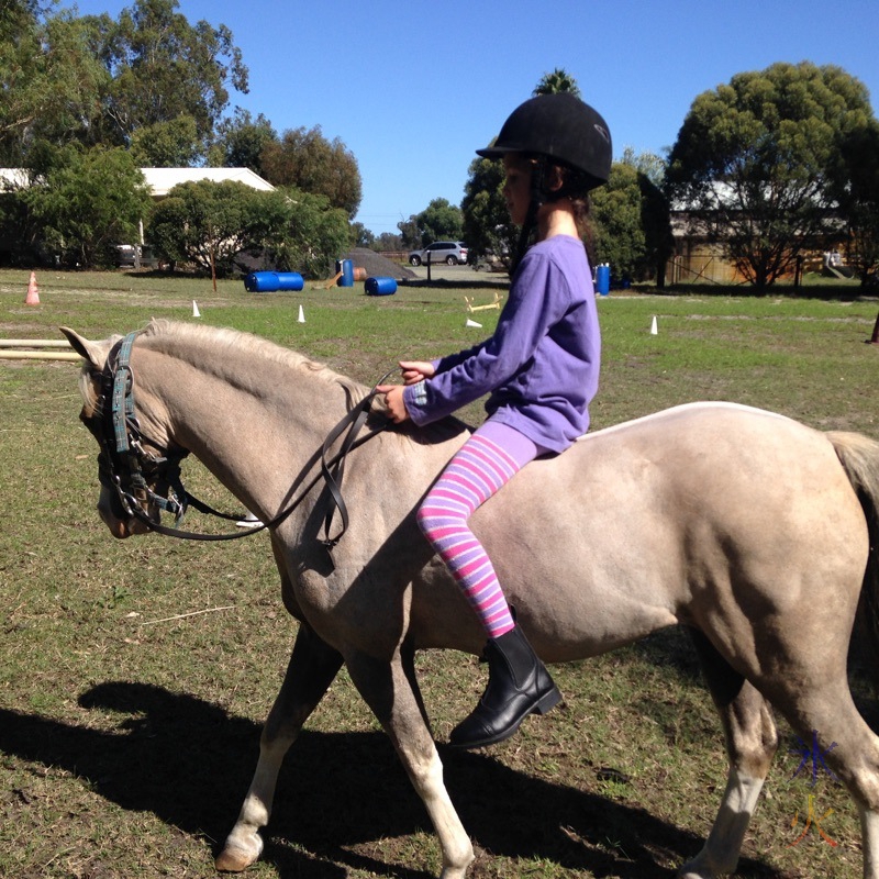 8yo bareback riding pony taken by riding instructor