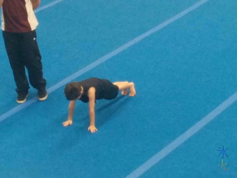 6yo doing a front support at his level 1 gymnastics badge test