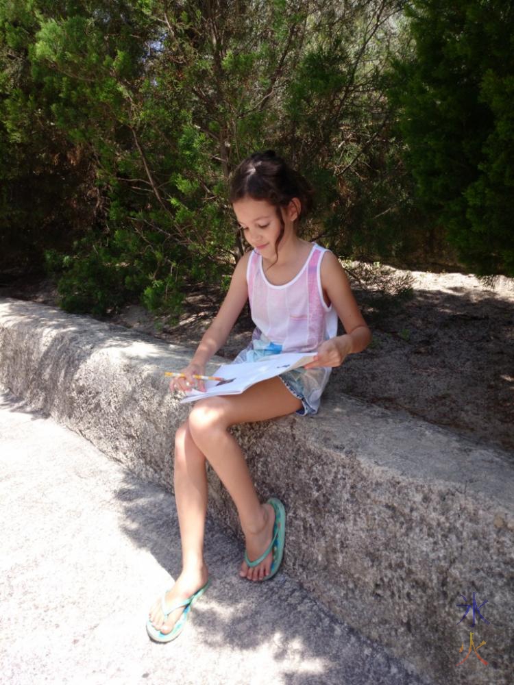 9yo taking notes on the fairy penguins at Perth Zoo, Western Australia