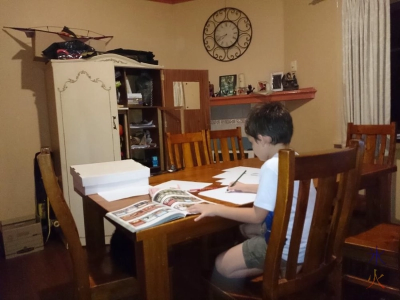 6yo drawing using Magic the Gathering encyclopedia as reference