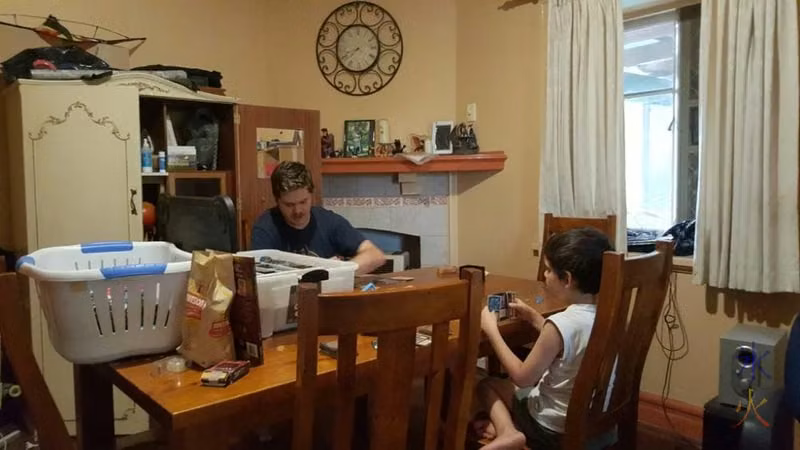 JJ and 6yo playing Magic: The Gathering