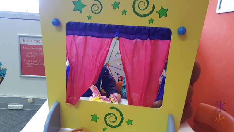 7yo putting on puppet show at State Library of Western Australia