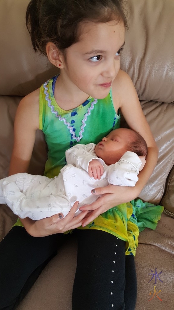 9yo with baby cousin