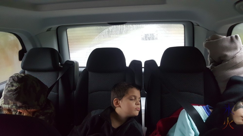 Kids asleep in the back of the car after snow play