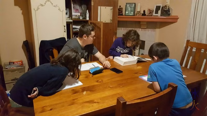 Doing bookwork with dad