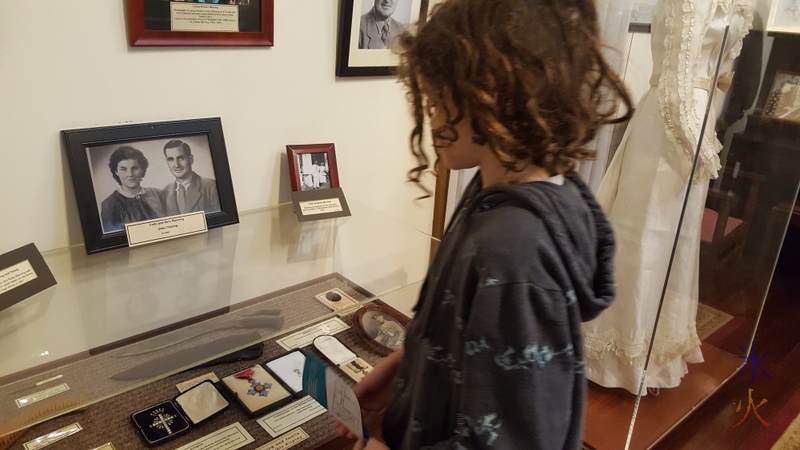 11yo looking at Manning family photos.  Azelia Ley's Edwardian wedding dress in the glass case.  Azelia Ley Homestead, Hamilton Hill, Western Australia