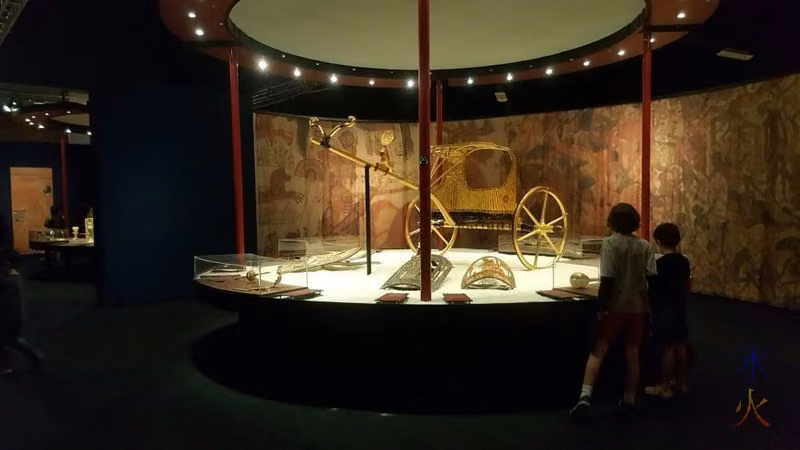 Homeschooled students admiring gold chariot grave good at King Tut exhibition, Perth Convention Centre, Perth, Western Australia