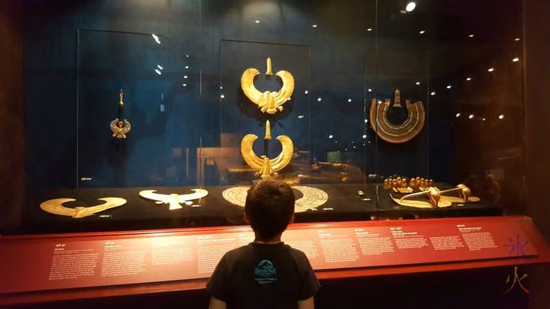 7yo studying adornments at King Tut exhibition, Convention Centre, Perth, Western Australia