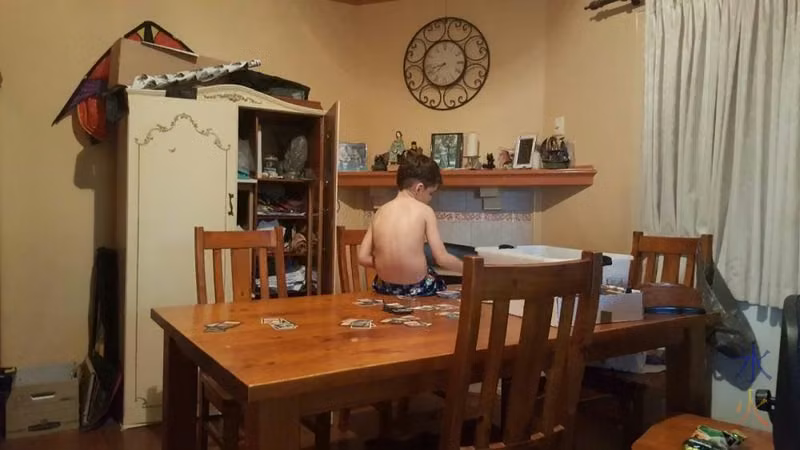 7yo building a Magic; The Gathering deck