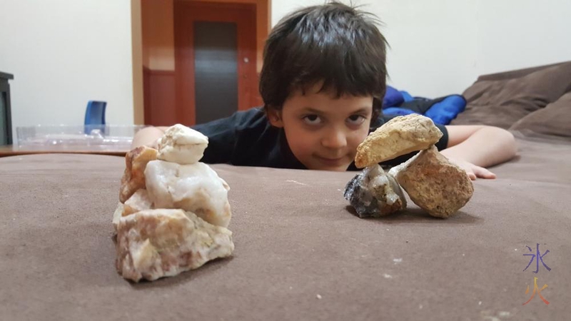 7yo with rock piles