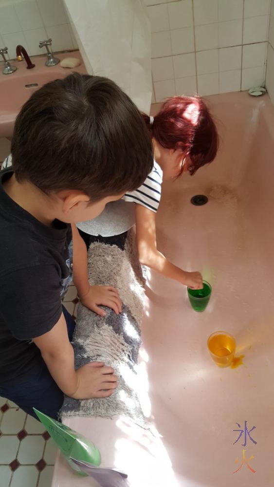 10yo setting up water mixing experiment