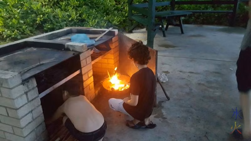 Helping to set up the wokfire, Lily Beach, Christmas Island