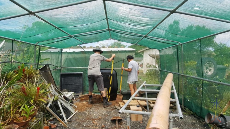 Backfilling a hole for a hydroponics system now the water supply is in