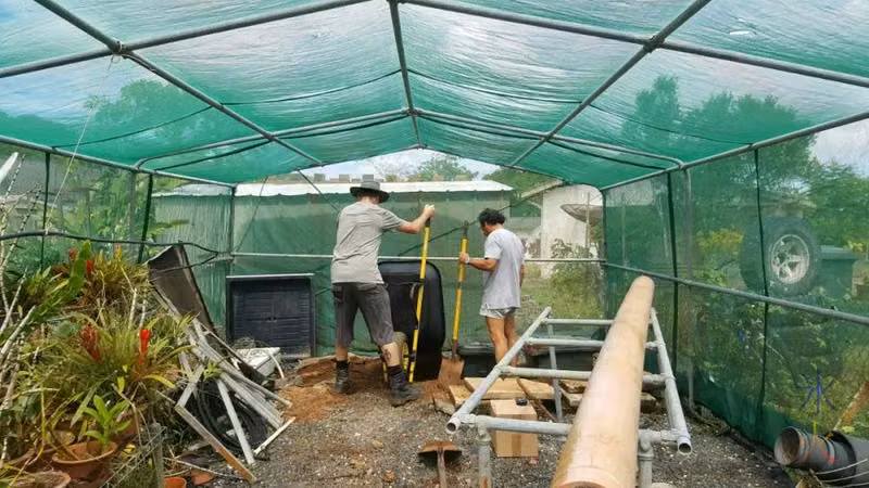 Backfilling a hole for a hydroponics system now the water supply is in
