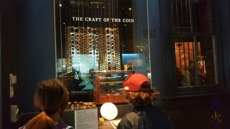 12yo-10yo-looking-at-craft-of-coin-display-perth-mint