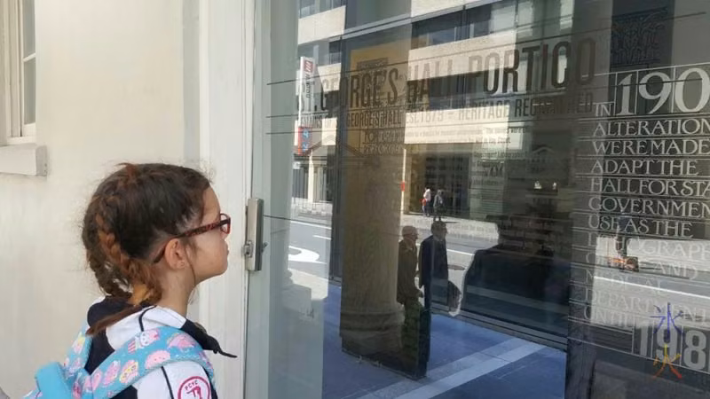 10yo-reading-about-historical-portico
