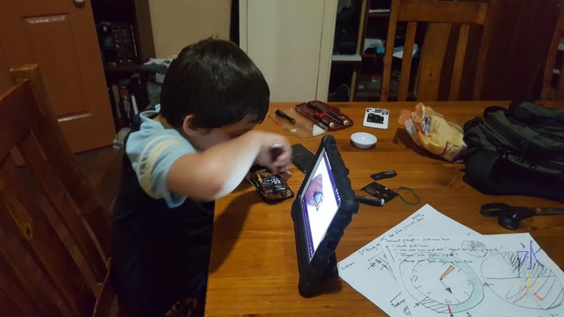 8yo-dismantling-old-phone