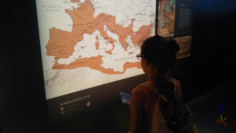 11yo-studying-map-pompeii-exhibition