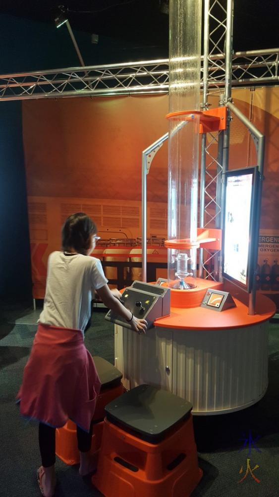 11yo working out bottle rocket mix, Planet Pioneers exhibition, SciTech, Perth, Western Australia