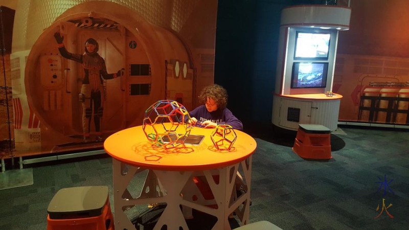 13yo building models at Planet Pioneers exhibition, SciTech, Perth, Western Australia