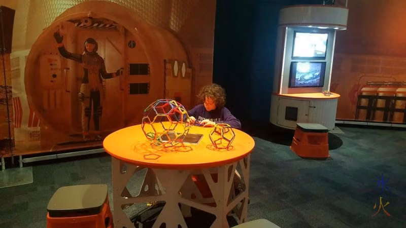 13yo building models at Planet Pioneers exhibition, SciTech, Perth, Western Australia