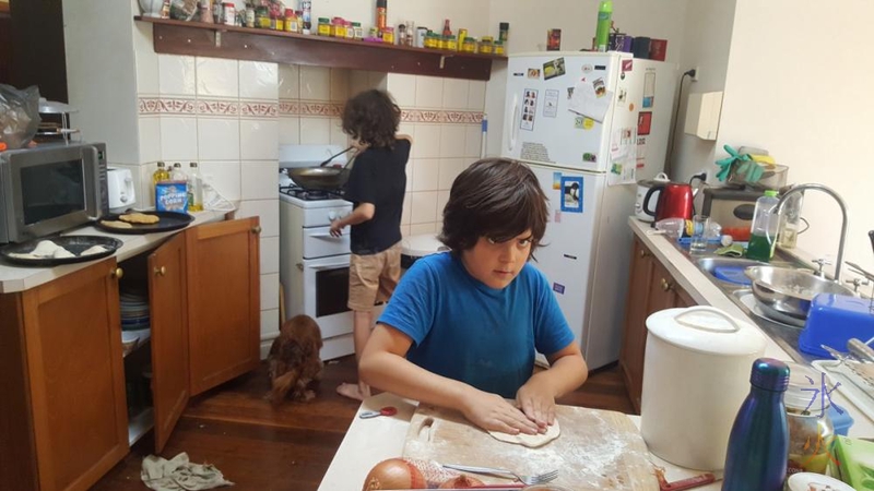 9yo helping 13yo with pastries