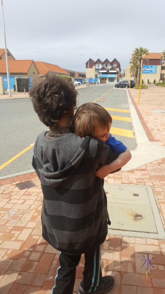 13yo-carrying-2yo-to-car-aqwa