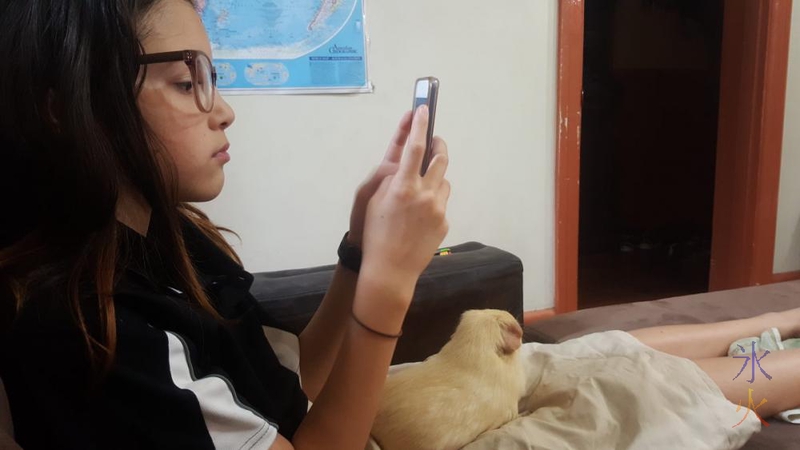 11yo-on-phone