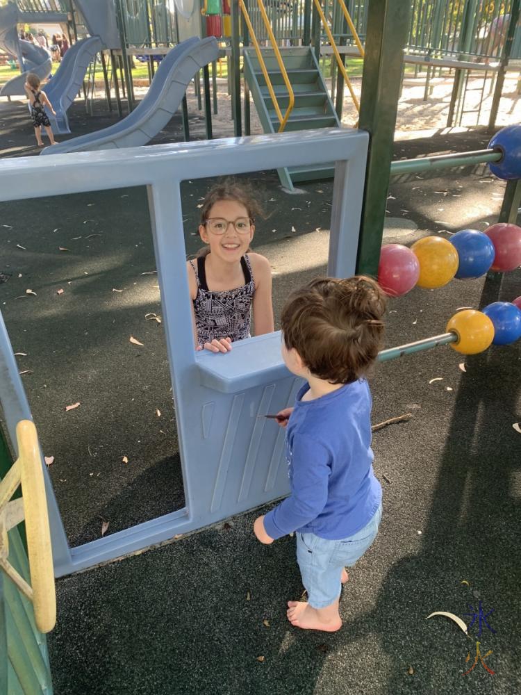 11yo playing shop with toddler