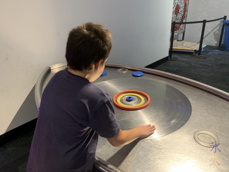 10yo playing with orbits at Scitech, Perth, Western Australia