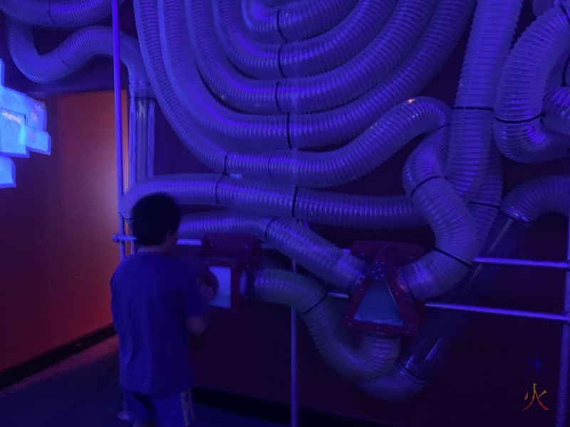 10yo playing with air valve maze at Scitech, Perth, Western Australia
