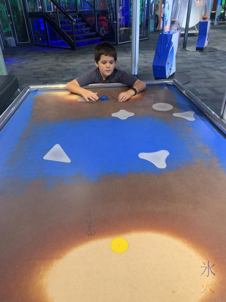 10yo playng with collision objects at Scitech, Perth, Western Australia