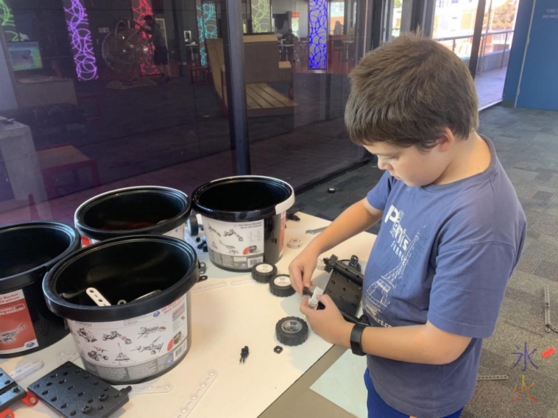 10yo building Meccano racer, Scitech, Perth, Western Australia