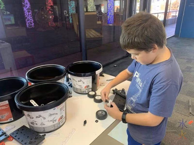 10yo building Meccano racer, Scitech, Perth, Western Australia