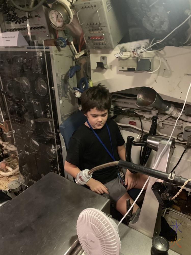 10yo in driver's seat of HMAS Ovens, Maritime Museum, Fremantle, Western Australia